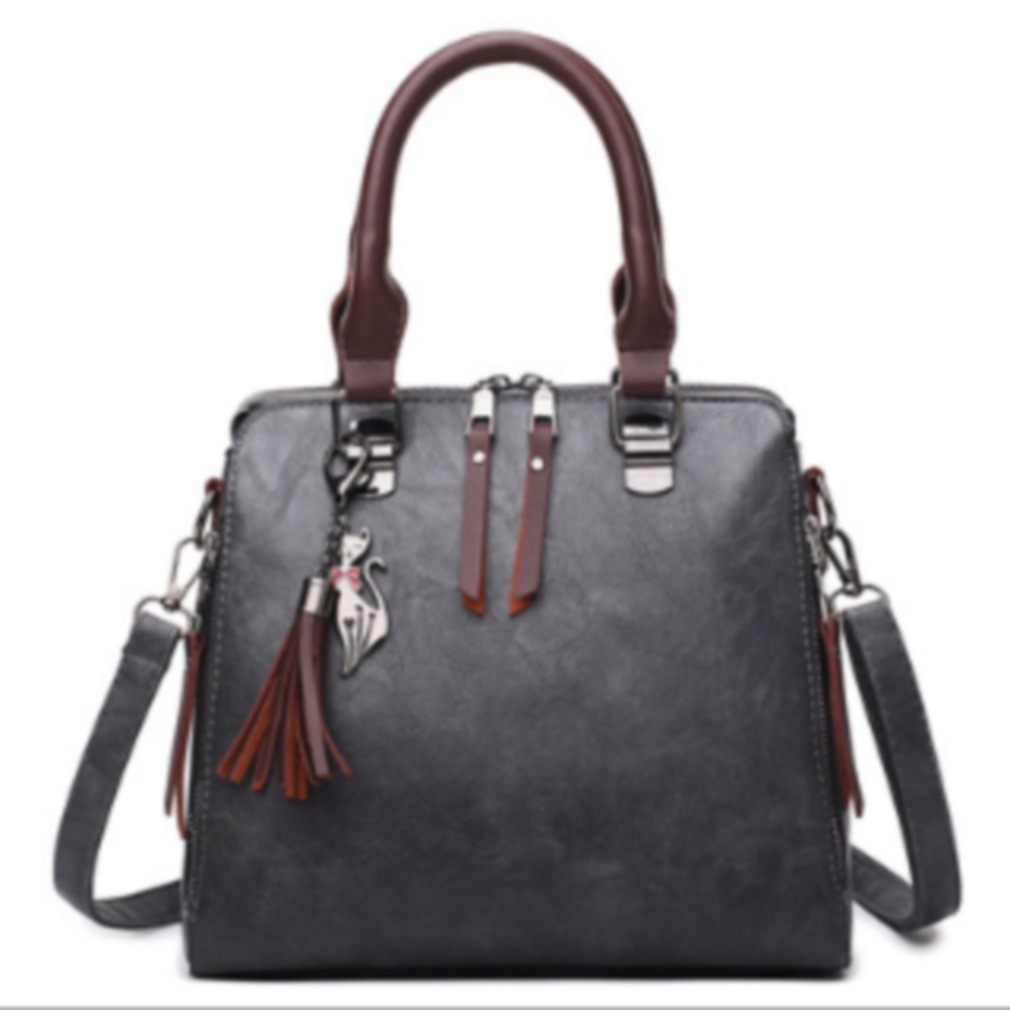 Superior Leather Tassel Cat Pendant Handbag Superior Leather Tassel Cat Pendant Handbag