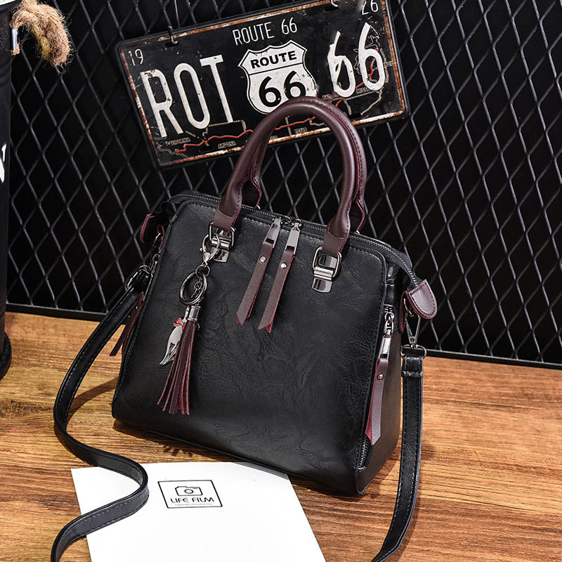 Superior Leather Tassel Cat Pendant Handbag